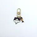 Close-up detail of the cute black and white cat alloy keychain with fish bone pendant. - All White Cat Style (11)