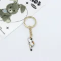 Cute calico cat keychain, metal alloy keyring, stylish bag pendant and car key accessory. - Tricolor Cat Style (2121)