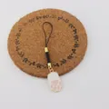 Cute white and pink cat paw phone charm pendant closeup detail shot for daily decoration - Pink and White Cute Cat Paw