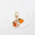 Cute orange fruit metal keychain alloy bag charm summer fresh accessory for keys and airpods. - Orange