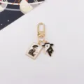 Detailed close-up shot of punk style plague doctor enamel keychain with tarot card pendant. - Tarot and Mask (Style 1)