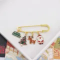 Detailed shot of cute Christmas safety pin brooch with hanging Santa and tree charms. - Santa Claus and Reindeer Style