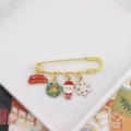 Christmas brooch detail featuring cute Santa, wreath, snowflake and holiday greeting metal charms. - Christmas Wreath and Santa Style