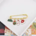 Exquisite Christmas brooch with cute snowman and Santa hat charms for festive outfit decor. - Snowman and Gift Box Style