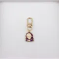 Close-up detail of the creative Mona Lisa cartoon metal keychain pendant, alloy accessory. - 2 Mona Lisa