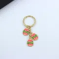 Easter bunny egg keychain, metal enamel pendant key ring for women girls daily bag charm decor. - Pink and Green Eggshell