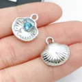 Hermosos colgantes de concha plateados con circonita azul para la joyería artesanal. - Plata Blanco UV Océano Azul Diamante de Imitación Concha (28174)