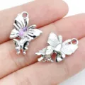 Silver alloy butterfly charms DIY jewelry pendant with pink gemstone for handmade craft earrings. - White K Purple Glass UV Butterfly (28429)