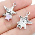 Detail view of DIY irregular star alloy jewelry charms, perfect for handmade necklaces earrings. - White K Purple Glass UV Starfish (28431)