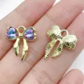Gold alloy bow charms with colorful crystal and textured designs for DIY jewelry making. - Purple (Rhinestone Colorful)