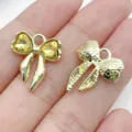 Gold bow alloy jewelry charms with yellow crystal and metal designs for DIY bracelets and earrings. - Yellow (Rhinestone Colorful)