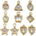 Set di ciondoli in lega dorata con zirconi trasparenti per dettagli di gioielli fai da te. - 8 Stili Misti (SN1759) / Confezione da 10 / Oro