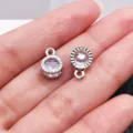 Ciondolo rotondo in lega argentata con zircone trasparente per collane orecchini DIY. - Stile Tondo (27785)
