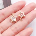 Ciondolo a forma di stella in lega dorata con zircone trasparente per gioielli fai da te - Forma a Stella (27794)