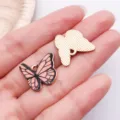 Close-up detail of cute pink butterfly enamel charm pendant for DIY jewelry making. - Flower Printed Butterfly (19058)