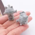 Cute gray flocked resin cat charm close-up, fuzzy texture mini keychain pendant detail. - 3D Cat Eating Fish (27485)