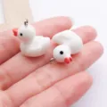 Cute white resin duck charms with metal loops for DIY jewelry, bracelets, and necklaces. - Resin Little Duck (17218) / 1 Piece (17x19mm) / White