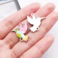 Close-up detail of colorful hummingbird enamel double-loop metal charms for DIY bracelets. - Double Link Little Hummingbird (28054)