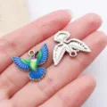 Close-up detail of colorful enameled hummingbird alloy charm pendant for DIY jewelry. - Blue Drop Oil Spread Wings Hummingbird (27649)