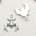 Silver alloy bat pendant charms for DIY Halloween jewelry making and crafts accessories. - 1 Piece (17x20m)