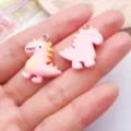 Roze cartoon dinosaurushars bedels voor DIY sieraden maken, schattige hanger voor ketting oorbellen. - Dier Kleine Dinosauriër (24515) / 1 stuk (24x19x5mm) / Roze
