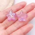 Ciondoli a stella in resina viola con glitter, fai da te per la creazione di gioielli. - Stella con glitter e paillettes / 1 Pezzo (20x18x6mm) / Viola Trasparente