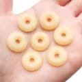 Yellow jade imitation peace buckle beads, DIY bracelet jewelry accessories, smooth round donut. - Yellow Lampwork Glass Ping'an Kou Donut Pendant (Small Hole)
