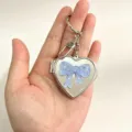 Silver heart shaped mirror keychain with cute blue bow, stylish bag charm and keyring pendant. - Blue Bowknot