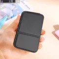 Portable folding pocket makeup mirror in black leather case, ideal for daily touch-ups. - Small PU Table Mirror (Black)