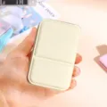 Portable mini makeup mirror, compact foldable design with leather case for daily touch up travel. - Small PU Table Mirror (Cream White)