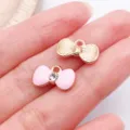 Pendentif noeud rose en métal breloque DIY bijoux accessoires pour collier bracelet - Nœud en Strass / 1 Pièce (14.6x9mm) / Rose