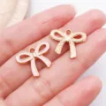 Pendentif noeud emaille rose breloques en metal pour bracelet DIY collier accessoires de bijoux. - Nœud ajouré / 1 Pièce/Paquet (18x16mm) / Rose