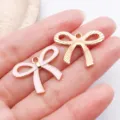 Pendentifs nœud rose et doré pour fabrication de bijoux DIY bracelet et collier - Grand Nœud Ajouré / 1 Pièce/Paquet (25x19mm) / Rose
