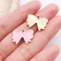 Pendentifs nœud rose et or, accessoires de bijoux DIY en émail ruban pour bracelets et colliers. - Nœud / 1 Pièce (14x18mm) / Rose