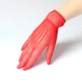 Red fishnet short gloves, hollow mesh design, stylish party performance accessories. - Red