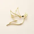 Minimalist gold hollow peace dove brooch detail, elegant lapel pin clothing accessory for daily wear. - Gold