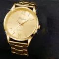 Gold quartz watch detail close-up, elegant metal strap, classic dial design, fashion accessory. - 6+Jewelry Set (Without Box)