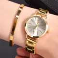 Gold tone quartz watch and matching love engraved metal bangle bracelet set for women detail. - Gold Jewelry Set Without Box