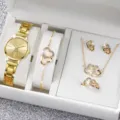 Gold quartz watch and sparkling heart jewelry set featuring necklace earrings and bracelet. - Gold Double Heart Set