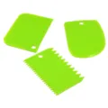Detail view of three green plastic dough scrapers for baking, cake cutting, and kitchen use. - Tools Set Combo / Green