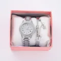 Elegant silver rhinestone women watch and matching bracelet set displayed in a pink gift box. - Watch Bracelet Gift Box Set / Silver