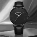 Orologio al quarzo da uomo elegante con quadrante nero testurizzato e cinturino in pelle. - Nero