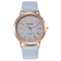 Orologio al quarzo da donna con cinturino in pelle azzurro, cassa oro rosa e quadrante glitter. - Azzurro