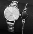Set di orologio da polso al quarzo da donna e bracciale con cuore, elegante orologio in acciaio argentato. - Orologio Tondo + Set Bracciale (52) / Argento