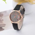 Vista dettagliata orologio al quarzo donna cinturino nero cassa oro rosa quadrante luna. - Solo orologio / Nero