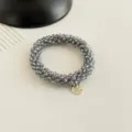 Koreanischer Stil Kristall Perlen Haargummi Armband mit Metall Anhänger Haar Accessoire - Eleganter Grau