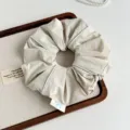 Korean minimalist beige fabric hair scrunchie with chic white piping for elegant daily styling. - Light Apricot