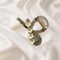 Sparkly rhinestone hair claw clip detail close up with delicate flower charms for half up hair. - Translucent Gray Ribbon Bow Claw Clip