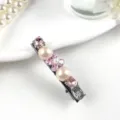 Detailed shot of sparkling rhinestone and pearl hair clip, elegant side barrette for women. - Type B Pink