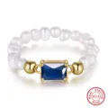 Anello in argento S925 con perle e pietra blu, elegante e regolabile gioiello donna. - Stile aperto con zirconia blu rettangolare e perla d'acqua dolce (GPR17-14K-B) / Blu/Oro